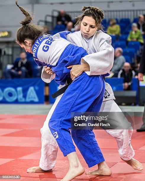 Commonwealth champion, Kimberley Renicks defends against an attack by Junior champion, Molly Harvey, 16. Renicks won the contest by a wazari to...
