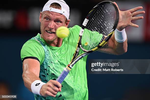 Sam Groth of Australia plays a backhand against Hyeon Chung of South Korea during day two of the 2016 Brisbane International at Pat Rafter Arena on...