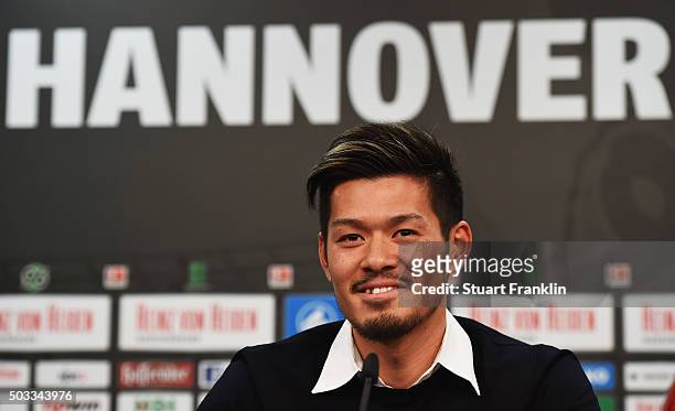 Hotaru Yamaguchi of Hannover talks with the media during a press conference to announce his joining of Hannover 96 on January 4, 2016 in Hanover,...