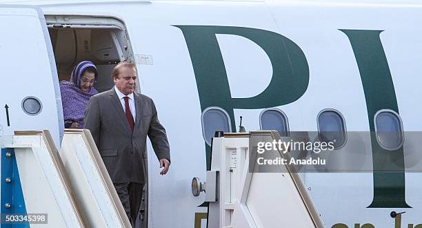 Pakistani Prime Minister Nawaz Sharif and his wife Kalsoom Nawaz Sharif arrive at Bandaranaike International Airport in Katunayake on January 4,...