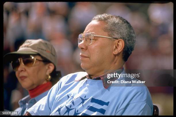 Retired Gen. Colin Powell & wife Alma during Clinton White House volunteerism agenda event at Marcus Foster Stadium.