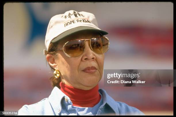 Alma Powell, retired Gen. Colin Powell's wife, in serious portrait during Clinton White House volunteerism agenda event at Marcus Foster Stadium.