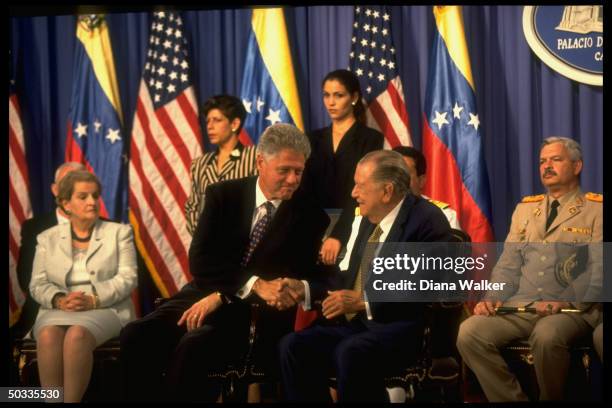 State Secy. Madeleine Albright, Pres. Bill Clinton & Venezuelan Pres. Rafael Caldera Rodriguez during agreement signing at Miraflores Palace.