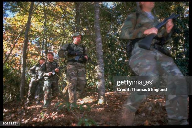 Armed search team in woods, looking for Eric Robert Rudolph, suspect in Jan. Bombing of Birmingham, AL abortion clinic killing off-duty policeman &...