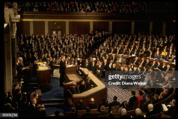 Pres. Bill Clinton delivering his State of Union address to Joint Session of Congress, assembly packed w. People eager to hear him speak amid...