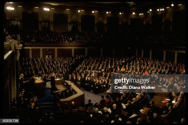 Pres. Bill Clinton delivering his State of Union address to Joint Session of Congress, assembly packed w. People eager to hear him speak amid...