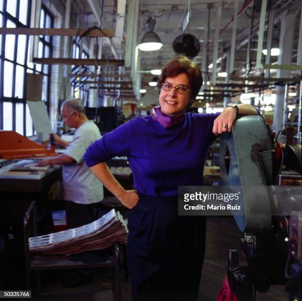 Portrait of PHC Industries VP of sales & co-owner Cindy Kerr, posing in autmotive-interior label making factory
