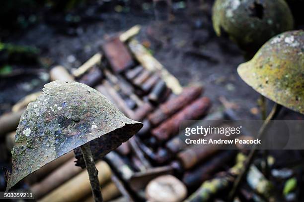 war relics at the japanese defensive position - ammunition stock pictures, royalty-free photos & images