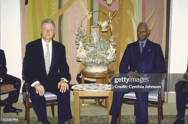 Pres. Bill Clinton & his host Pres. Abdou Diouf of Senegal mtg. At presidential palace.