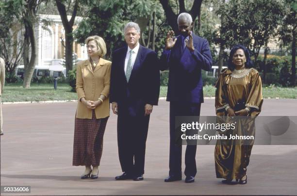 Pres. Bill & Hillary Rodham Clinton w. Their hosts Pres. Abdou & Mrs. Diouf of Senegal at presidential palace event.