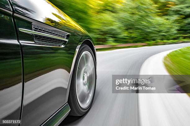 sports car driving - ferrari foto e immagini stock