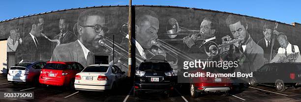 Panoramic view of Pamela Bliss' 'Jazz Masters Of Indiana Avenue' mural, featuring David Young, Jimmy Coe, David Baker, J.J. Jphnson, Slide Hampton,...