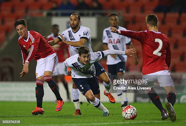 Harry Winks of Tottenham Hotspur U21 takes on Guillermo Varela of Manchester United U21 during the Barclays U21 Premier League match between...