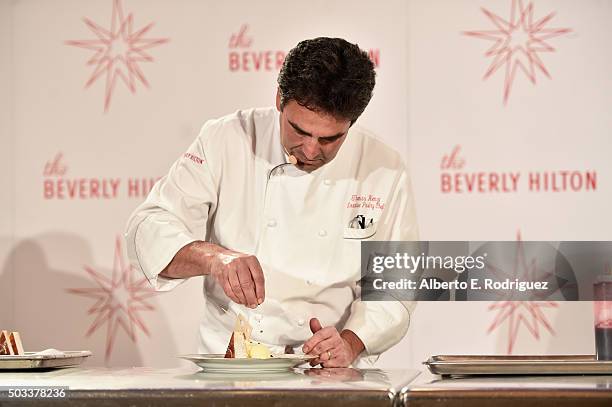 Executive Pastry Chef Thomas Henzi prepares the dessert at the 73rd Golden Globes Menu Preview at The Beverly Hilton Hotel on January 4, 2016 in...