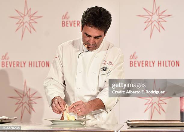 Executive Pastry Chef Thomas Henzi prepares the dessert at the 73rd Golden Globes Menu Preview at The Beverly Hilton Hotel on January 4, 2016 in...