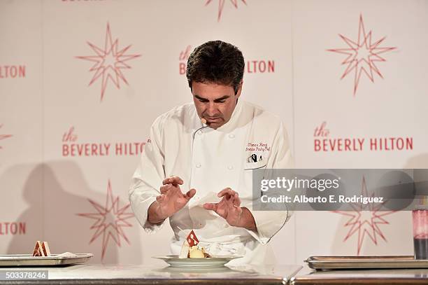 Executive Pastry Chef Thomas Henzi prepares the dessert at the 73rd Golden Globes Menu Preview at The Beverly Hilton Hotel on January 4, 2016 in...