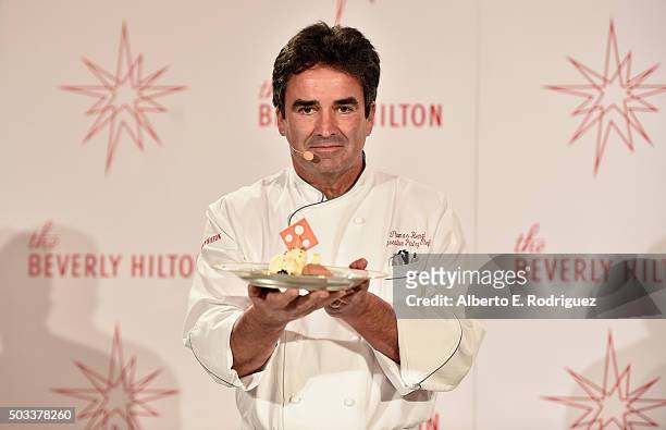 Executive Pastry Chef Thomas Henzi prepares the dessert at the 73rd Golden Globes Menu Preview at The Beverly Hilton Hotel on January 4, 2016 in...