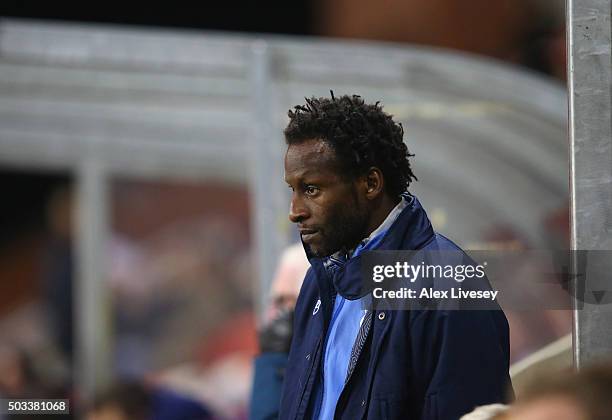 Ugo Ehiogu the manager of Tottenham Hotspur U21 looks on during the Barclays U21 Premier League match between Manchester United U21 and Tottenham...