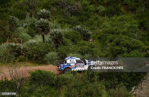 Spain's driver Xavier Pons and co-driver Adrian Ricardo Torlaschi compete in the 2016 Dakar Rally's Stage 2 between Villa Carlos Paz and Termas de...