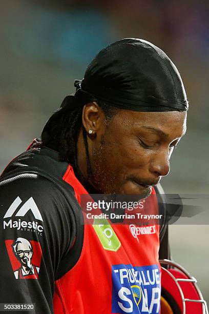 Chris Gayle of the Melbourne Renegades holds back laughter while giving a TV interview to Mel Mclaughlin during the Big Bash League match between the...