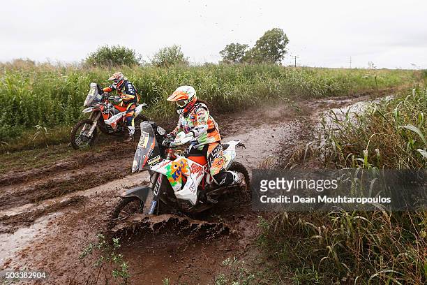Laia Sanz of Spain riding on and for KTM 450 RALLY REPLICA KTM RACING TEAM and Olivier Pain of France riding on and for KTM 450 RALLY REPLICA NOMADE...