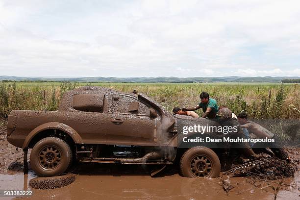 Xavier Pons of Spain and Adrian Ricardo Torlaschi of Argentina in the FORD RANGER for DMAS SOUTH RACING are helped by spectators after getting stuck...