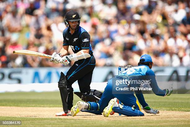 Kane Williamson of New Zealand is caught by Dinesh Chandimal of Sri Lanka game five of the One Day International series between New Zealand and Sri...