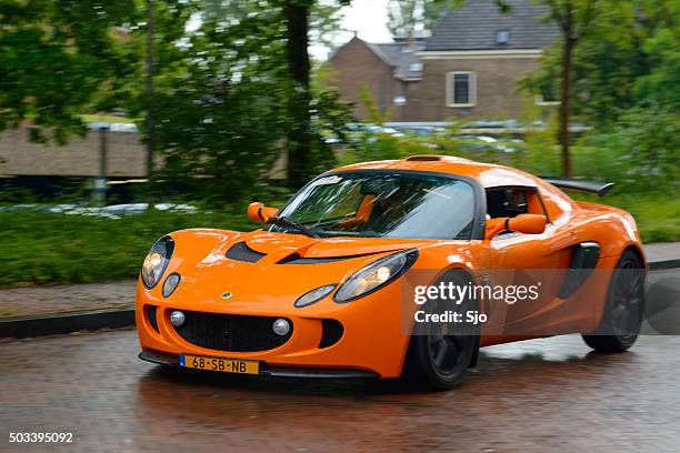 lotus requires sports car - lotus brand name stock pictures, royalty-free photos & images