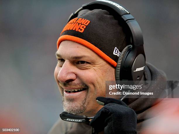 Head coach Mike Pettine of the Cleveland Browns laughs as he walks along the sideline during a game against the Pittsburgh Steelers on January 3,...