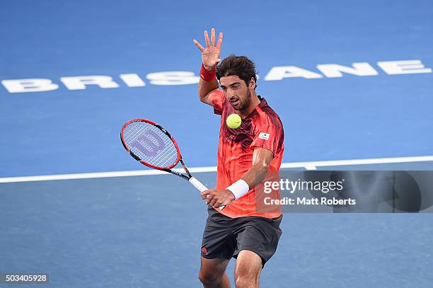 Thomaz Bellucci of Brazil plays a backhand against David Goffin of Belgium during day three of the 2016 Brisbane International at Pat Rafter Arena on...