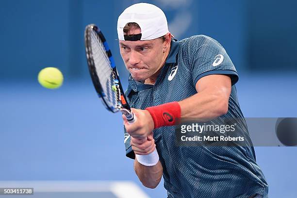 James Duckworth of Australia plays a backhand against Dominic Thiem of Austria during day three of the 2016 Brisbane International at Pat Rafter...