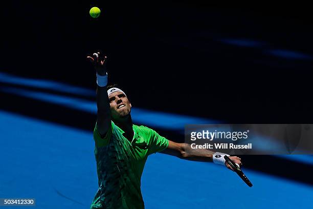 Jiri Vesely of the Czech Republic serves in the men's single match against Alexandr Dolgopolov of the Ukraine during day three of the 2016 Hopman Cup...