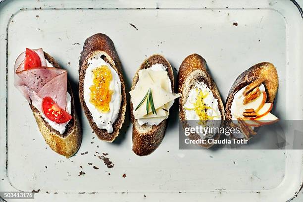 variety of crostini - crostini stock pictures, royalty-free photos & images