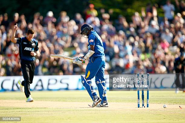 Dushmantha Chameera of Sri Lanka is bowled by Matt Henry of New Zealand during game five of the One Day International series between New Zealand and...