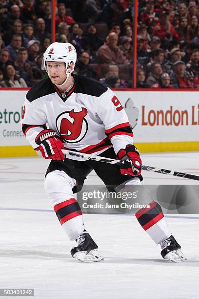 Jiri Tlusty of the New Jersey Devils skates against the Ottawa Senators at Canadian Tire Centre on December 30, 2015 in Ottawa, Ontario, Canada.