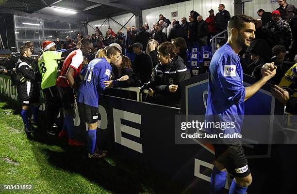 Players of FC Chambly celebrate their victory 4-1 against Stade de Reims following the French Cup match at Stade des Marais on January 2, 2016 in...