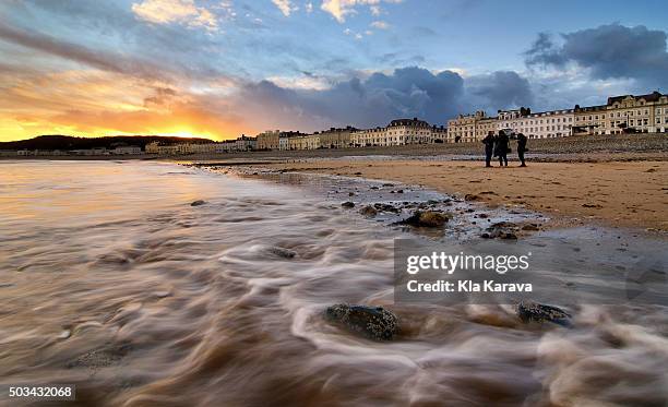 dramatic sunrise at llandudno, wales - llandudno stock pictures, royalty-free photos & images