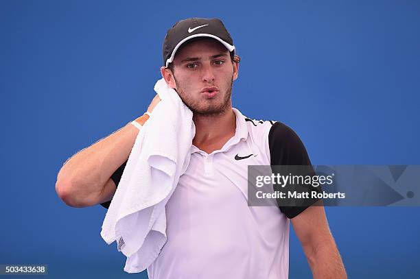 Oliver Anderson of Australia looks on in his match against Ivan Dodig of Coratia during day three of the 2016 Brisbane International at Pat Rafter...