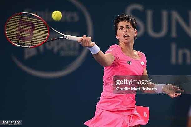 Carla Suarez Navarro of Spain plays a forehand against Sam Stosur of Australia during day three of the 2016 Brisbane International at Pat Rafter...