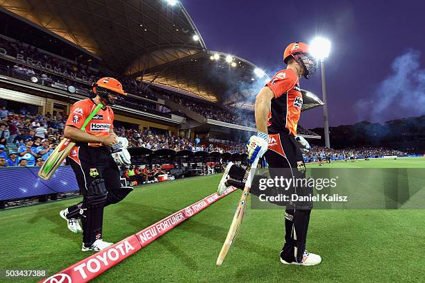 Shaun Marsh of the Scorchers and Michael Klinger of the Scorchers walk out onto the field during the Big Bash League match between the Adelaide...