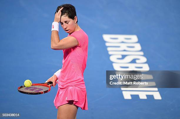 Carla Suarez Navarro of Spain looks dejected in her match against Sam Stosur of Australia during day three of the 2016 Brisbane International at Pat...