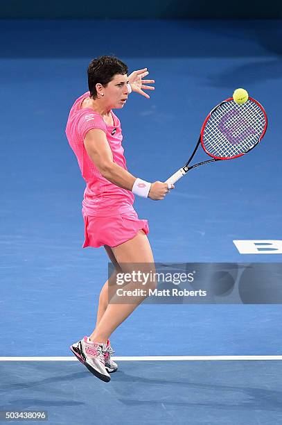 Carla Suarez Navarro of Spain plays a backhand against Sam Stosur of Australia during day three of the 2016 Brisbane International at Pat Rafter...