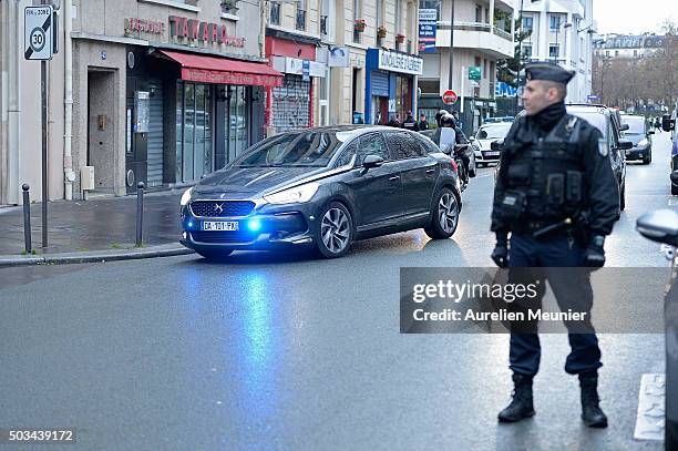 Officials arrive to the inauguration of the memorial stone in front of the former Charlie Hebdo office on January 5, 2016 in Paris, France. One year...