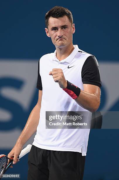 Bernard Tomic of Australia reacts in his match against Nicolas Mahut of France during day three of the 2016 Brisbane International at Pat Rafter...