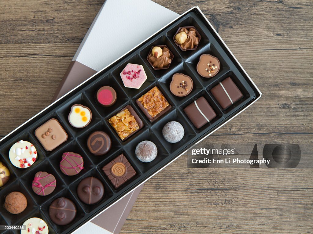 Assorted chocolates in a box (overhead view)