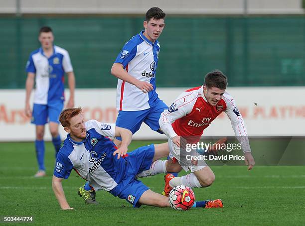 Dan Crowley of Arsenal is fouled by David Carson of Blackburn during the Barclays Premier U21 match between Arsenal U21 and West Bromwich Albion U21...