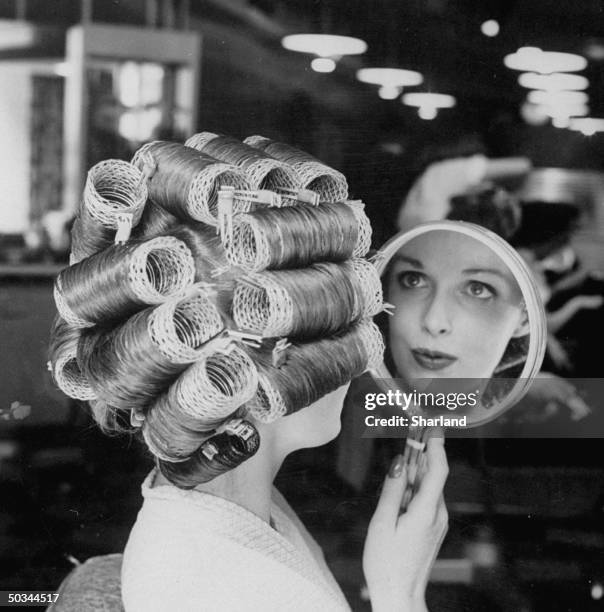 Special curlers which are 1 3/4 wide are used by New York's Michel of Paris to prepare the Bouffant hair style.