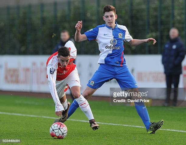 Ismael Bennacer of Arsenal is challenged by Joseph Rankin-Costello of Blackburn during the Barclays Premier U21 match between Arsenal U21 and West...