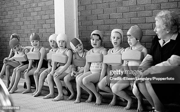 Swimming lesson for the pupils of St Osburg's primary school in Coventry, England, circa 1980.