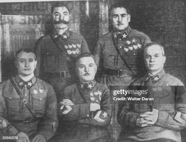 Kiliment Voroshilov in uniform with others.